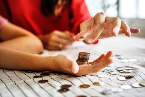 Business woman counting change